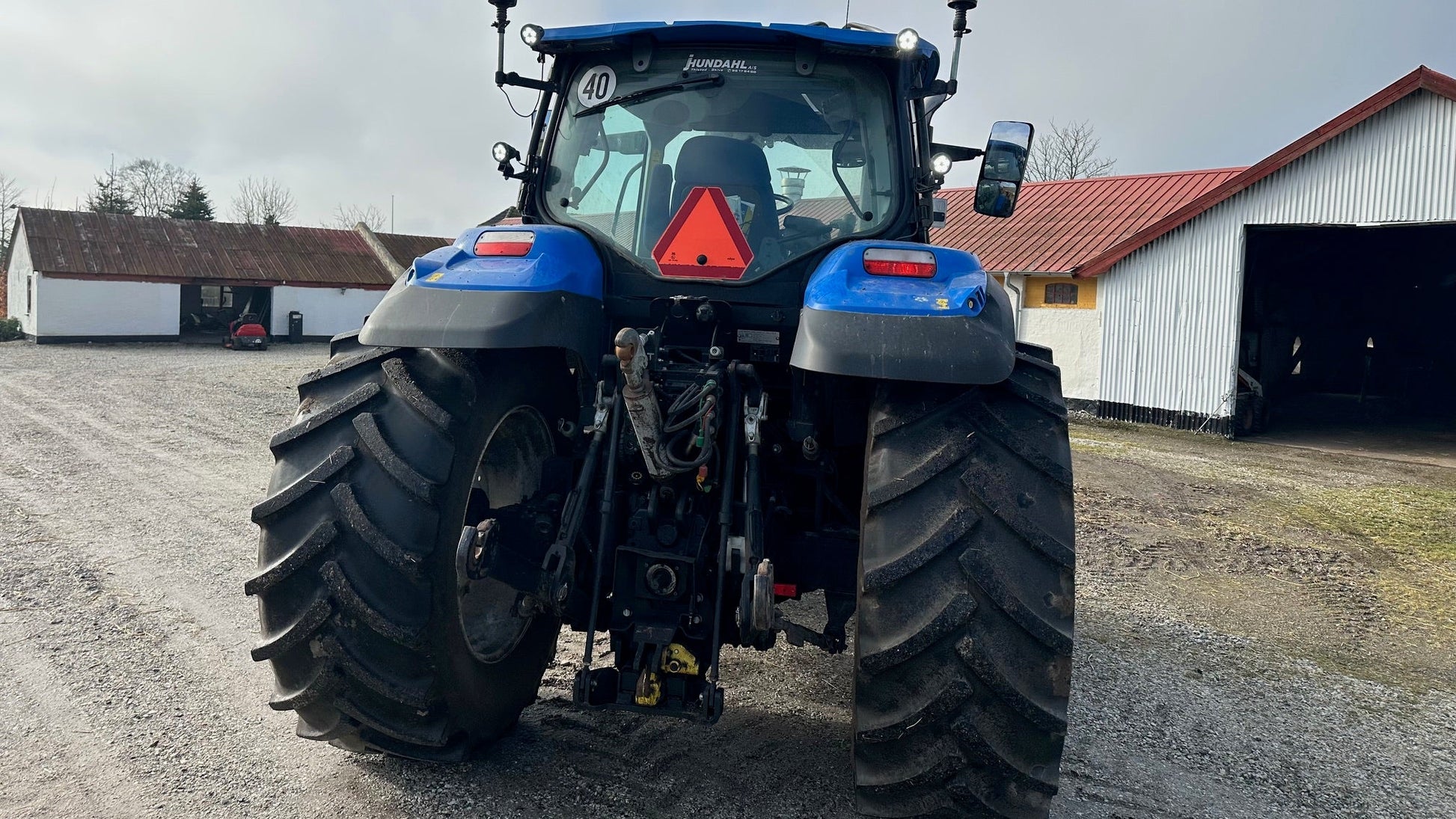 New Holland T7.165 Med ÅLØ Q65 frontlæsser, frontlift og hitch krog fra AV - Larsen - AV - Larsen